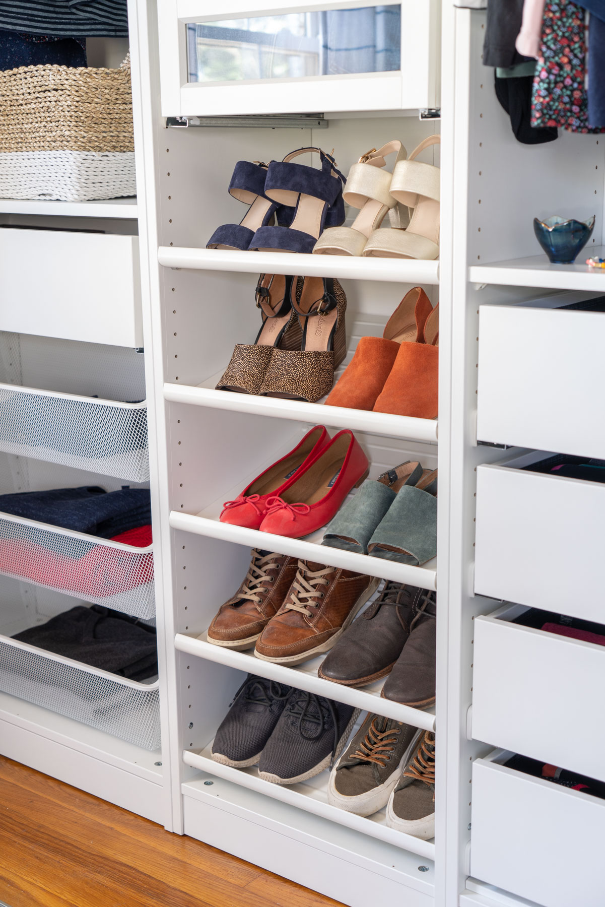 Pairs of shoes on IKEA's KOMPLEMENT shoe shelves