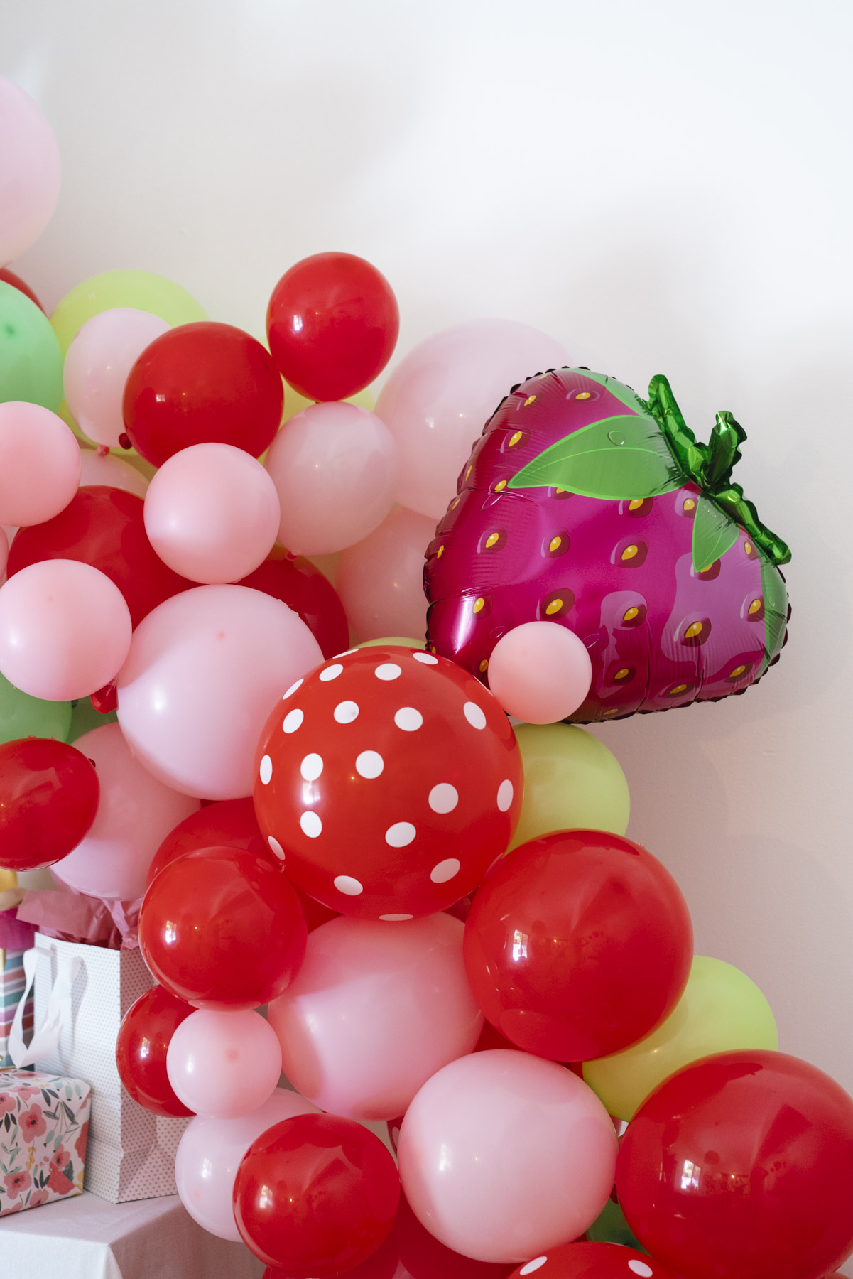 Close up of the strawberry balloon arch. 