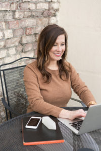 Woman entrepreneur working on her laptop