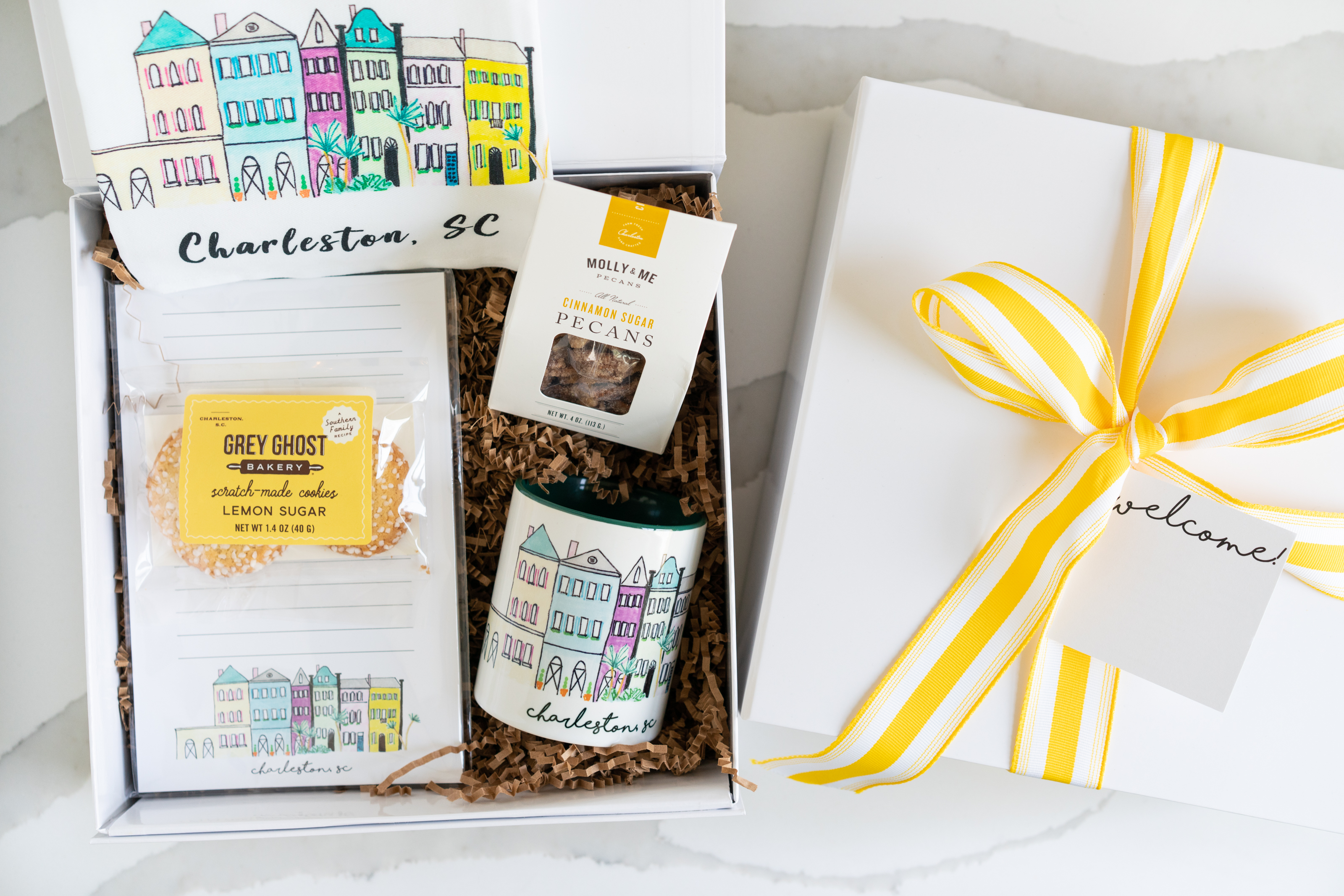 An overhead shot of a custom gift box featuring products from Charleston, South Carolina