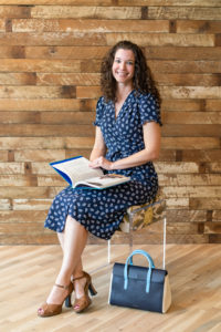 Portraits for Draper James: Amanda Heckert dressed in Draper James and reading Garden and Gun's new book, Southern Women