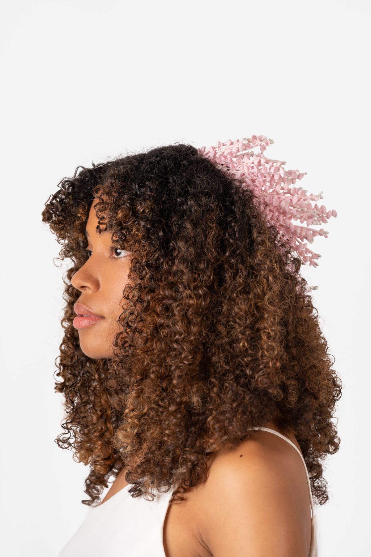 Fashion shot of a model wearing a Mariee Lace Veils headpiece