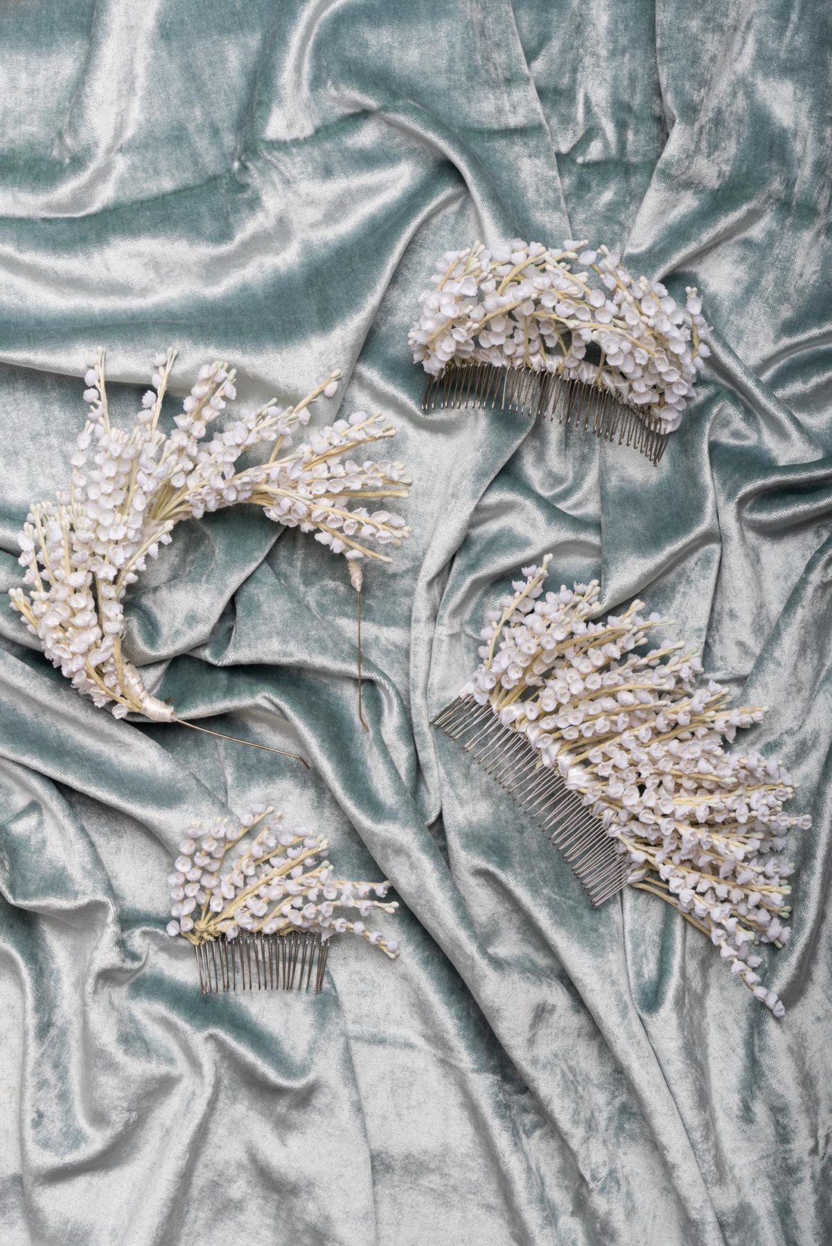 Flat lay of Mariee Lace Veil custom wedding headbands