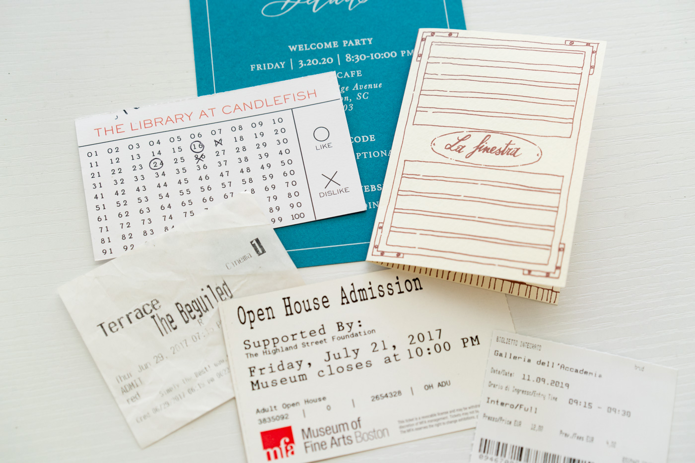 Collection of memorabilia like tickets and invitations for scrapbooking