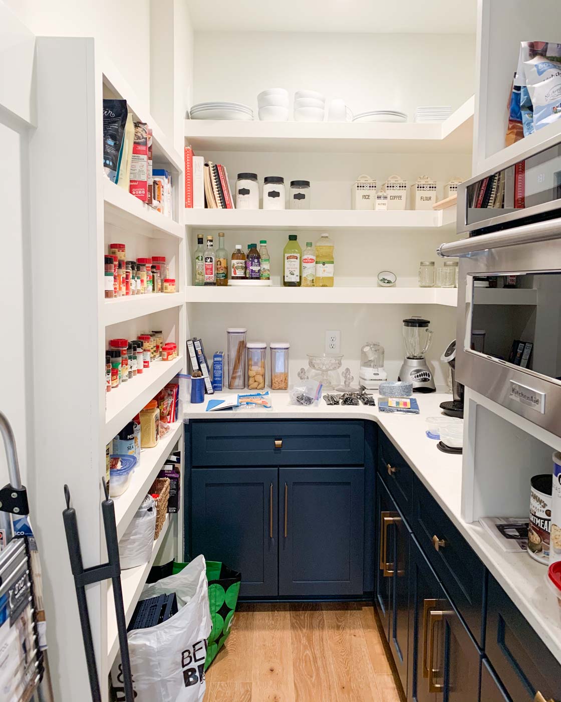 A before image of a kitchen pantry to demonstrate how to organize your pantry