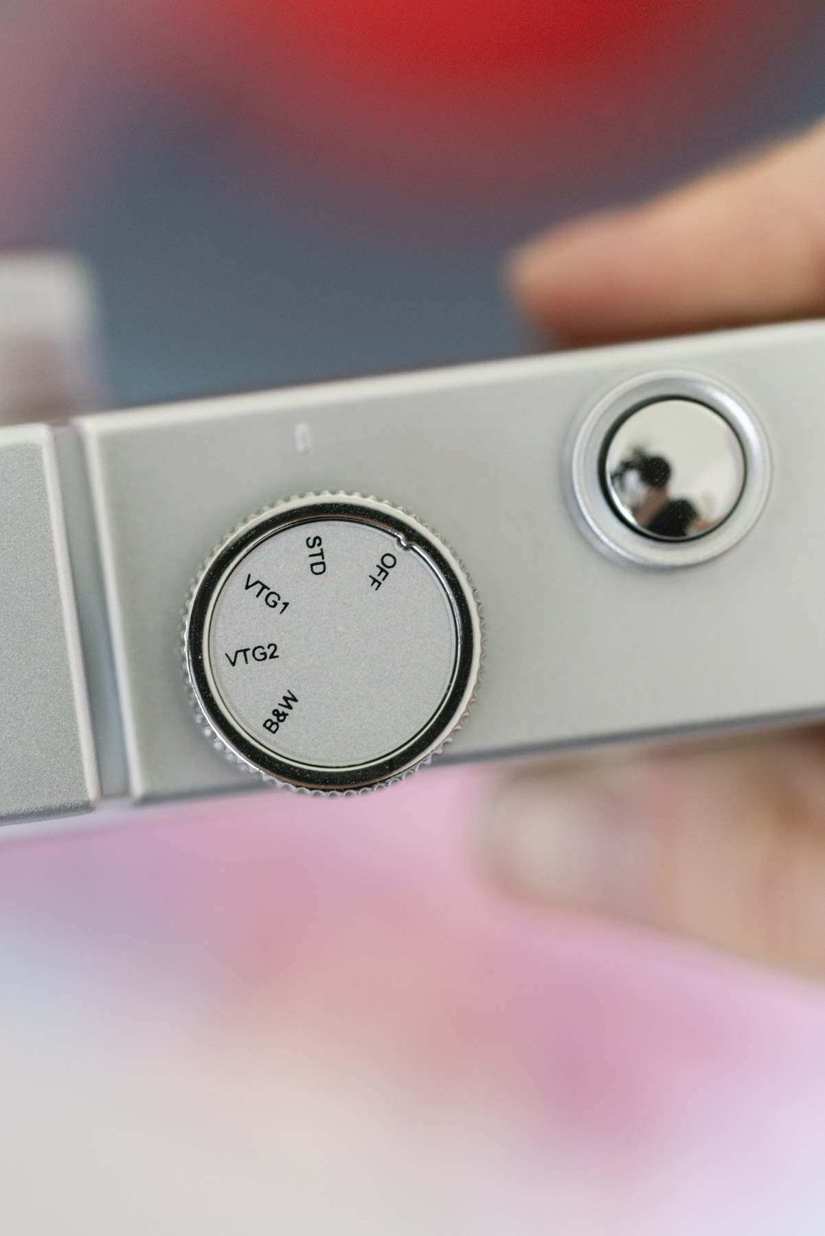 Close-up of a screen-free digital camera's filter dial 