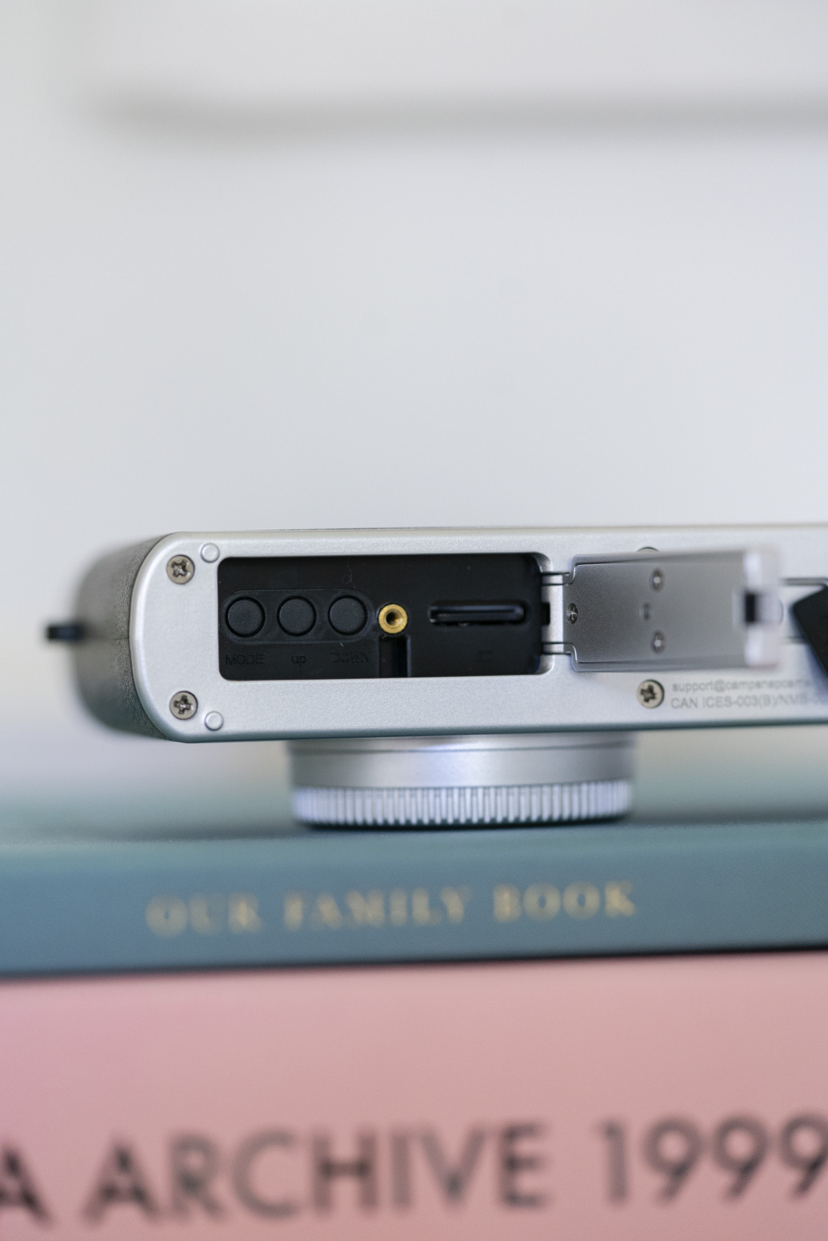 Detail of the Camp Snap Pro's memory card and settings door